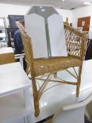 A CREAM FRAMED DRESSING MIRROR AND CANE TUB ARMCHAIR (2)