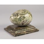 GREEN ONYX EGG ON OBLONG STAND PAPERWEIGHT