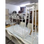 A WHITE PAINTED METAL TWO TIER BAMBOO PATTERN OCCASIONAL TABLE AND A WHITE FINISH TORCHERE STAND AND