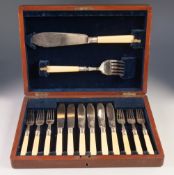 CASED SET OF SIX PAIRS OF FISH EATERS AND SERVERS, with bone handles and engraved blades, in a