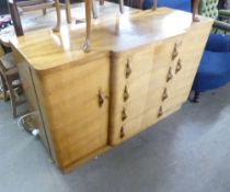 AN ART DECO DINING ROOM SUITE COMPRISING OF A BREAKFRONT SIDEBOARD OF FOUR GRADUATED CENTRAL