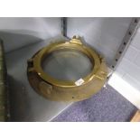 HEAVY CAST BRASS SHIPS PORTHOLE, of conventional design but lacking hinge pin, fastening pieces