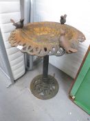 A METAL BIRDBATH