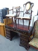 A REPRODUCTION MAHOGANY KNEEHOLE PEDESTAL DESK, WITH GILT AND RED LEATHER INSET TOP, ALSO A
