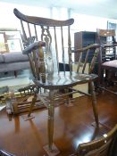 SET OF SIX HARDWOOD COMB BACKED WINDSOR DINING CHAIRS WITH PANEL SEATS, INCLUDING THE CARVER'S