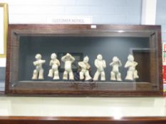 A WELL PRESENTED SUITE OF SEVEN COMPOSITION REPLICA CHINESE TANG STYLE FIGURES in broad wooden