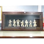 A WELL PRESENTED SUITE OF SEVEN COMPOSITION REPLICA CHINESE TANG STYLE FIGURES in broad wooden