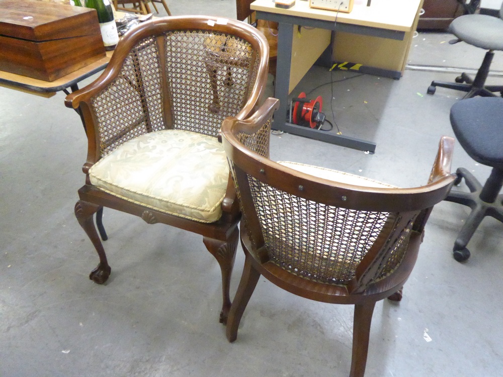 CIRCA 1930's MAHOGANY PAIR OF TUB CHAIRS, HAVING CANE BACK AND SEAT, ALL RAISED ON CABRIOLE FRONT