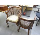 CIRCA 1930's MAHOGANY PAIR OF TUB CHAIRS, HAVING CANE BACK AND SEAT, ALL RAISED ON CABRIOLE FRONT