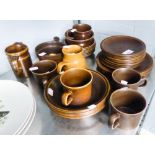 A WEDGWOOD DARK BROWN POTTERY PART TEA AND DINNER WARES AND OTHER SIMILAR ITEMS (35 ITEMS)