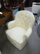 PAIR OF SMALL BOUDOIR TUB SHAPED EASY ARMCHAIRS, ALL-UPHOLSTERED AND COVERED IN CREAM CLOTH