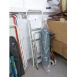 A GREEN CANVAS GARDEN UMBRELLA, A FOLDING WALKING FRAME AND TWO SETS OF STEP LADDERS (4)