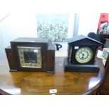 A VICTORIAN MANTEL CLOCK IN BLACK SLATE ARCHITECTURAL CASE AND AN OAK CASED MANTEL CLOCK (2)