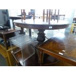 EARLY NINETEENTH CENTURY MAHOGANY BREAKFAST TABLE, the moulded circular snap top above a heavy