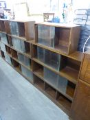 TWO UNIX' THREE SECTION OAK BOOKCASES AND TWO SMALLER SECTIONS (ALL WITH GLASS SLIDING DOORS)