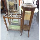 AN EDWARDIAN INLAID MAHOGANY CIRCULAR PLANT STAND, ALSO AN OAK UMBRELLA STAND (2)