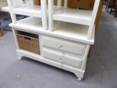 A WHITE FINISH COFFEE TABLE WITH TWO DRAWERS AND A WICKER BASKET