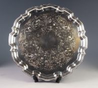 MODERN CHIPPENDALE STYLE ELECTROPLATED TRAY, of circular form with wavy outline and foliate scroll