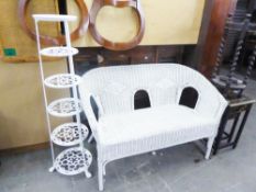 A TALL WHITE METAL PAN STAND AND A WHITE WICKER TWO SEATER SETTEE (2)