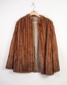 A LIGHT BROWN MINK JACKET