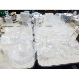 A GROUP OF MISC DRINKING GLASSES, SERVING BOWLS, CHAMPAGNE FLUTES, WINE GLASSES ETC...