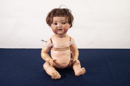 PROBABLY KAMMER AND REINHARDT GIRL BABY DOLL, with socketed bisque head, blue glass flirty eyes, the