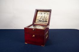 A MODERN MAHOGANY CASED SEWILLS SEALORD, MAKER TO THE ADMIRALTY SHIPS CHRONOMETER, in gimballed