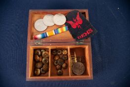 WALNUTWOOD ROYAL ARTILLERY TABLE CIGARETTE with regimental metal badge to the hinged lid, 72 wide; A