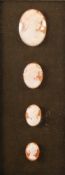 FIVE PROBABLY EIGHTEENTH CENTURY OVAL PLASTER CAMEOS, four being heads of Roman noblemen or