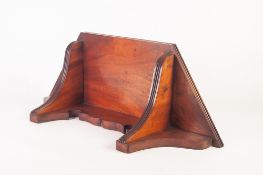 EARLY TWENTIETH CENTURY FIGURED MAHOGANY WALL BRACKET, the half hexagonal top with two brackets with