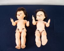 TWO PEDIGREE HARD PLASTIC GIRL BABY DOLLS, with walking and head action, sleeping blue glass eyes,