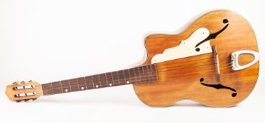CIRCA 1960's SIX STRING ACOUSTIC GUITAR, the shaped body with pieced 'F' holes and an ivorine