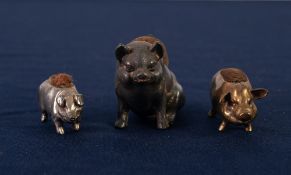 VICTORIAN SILVER PLATED PIN CUSHION in the form of a seated pig, 2" high and TWO METAL SMALL