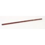 EARLY TWENTIETH CENTURY SHORT SWORDSTICK, MADE AS A STITCHED BROWN LEATHER SWAGGER STICK, the