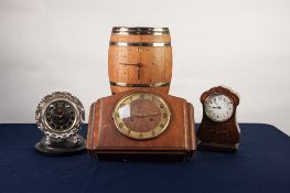 AN EDWARDIAN INLAID MAHOGANY CASED MANTEL CLOCK, and three other clocks various (4)