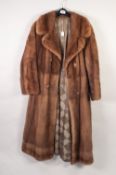 LADY'S LIGHT BROWN PASTEL MINK FULL-LENGTH COAT with revered collar, double-breasted four button f