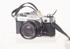 CANON AE-1 35mm SLR ROLL FILM CAMERA WITH 50mm, f1.8 LENS, no: 3472195