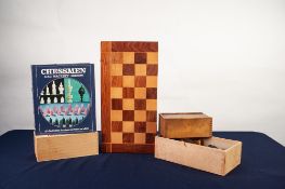 PROBABLY FAR EASTERN INTRICATE CARVED WOOD TOTEM STYLE CHESS SET, in a walnutwood and marquetry