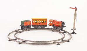 BRIMTOY ALMOST MINT AND BOXED 'O' GAUGE LITHOGRAPHED TINPLATE CLOCKWORK 0-4-0 TRAIN AND TENDER, '