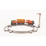 BRIMTOY ALMOST MINT AND BOXED 'O' GAUGE LITHOGRAPHED TINPLATE CLOCKWORK 0-4-0 TRAIN AND TENDER, '