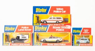 FOUR DINKY-DIE CAST TOYS, VIRTUALLY MINT AND BOXED AND POLICE RELATED, 243 Volvo and 264 Rover