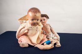 S.F.B.J. PARIS, EARLY TWENTIETH CENTURY BISQUE HEADED CHARACTER DOLL, with nine part composition