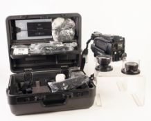 MINOLTA C-1E VHS MOVIE CAMERA, with accessories, in Minolta fitted hard case