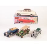 MINT AND BOXED JAPANESE TINPLATE AND PLASTIC MODEL OF A 1950's BUICK SEDAN CAR, brown and cream,