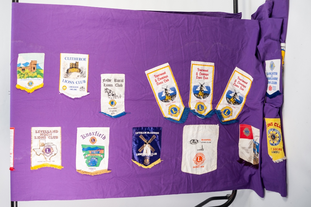 A LONG PURPLE FABRIC SHEET, applied with approx 40 Lions Club pennants - Image 2 of 4
