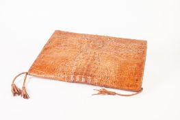 TAN COLOURED CROCODILE SKIN DOCUMENT HOLDER, of typical form, with compartments an dividers to the