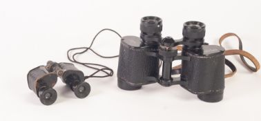 A LEATHER CASED PAIR OF BINOCULARS, and a SMALLER PAIR DITTO (2)