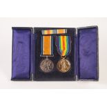 TWO WORLD WAR I SERVICE MEDALS TO 205373 Pte. G.C. Aiken, Norfolk Regiment on respective ribbons, in