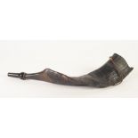 LATE NINETEENTH CENTURY HORN, carved from a large twisted and ridged rams horn, separate turned