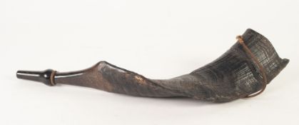LATE NINETEENTH CENTURY HORN, carved from a large twisted and ridged rams horn, separate turned
